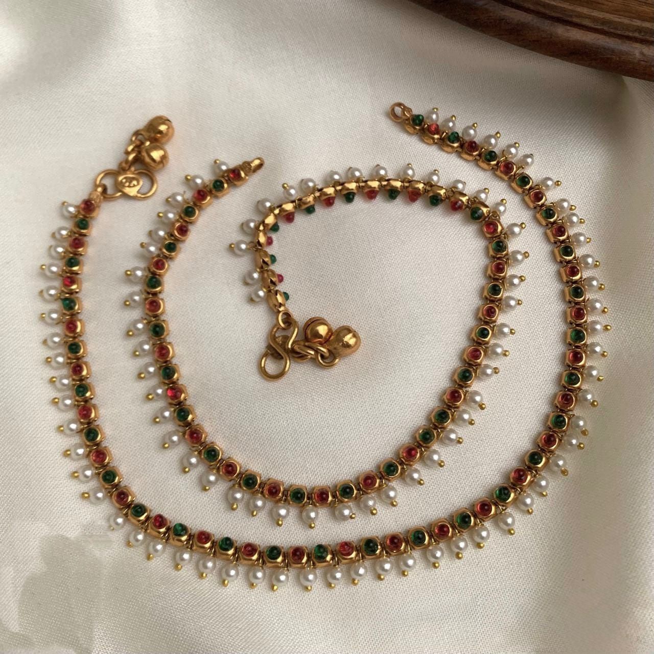 Green and white stone anklets